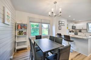 a kitchen and dining room with a table and chairs at Updated Ronks Home about 8 Mi to Dtwn Lancaster! in Ronks