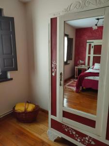 A bed or beds in a room at Casa Joglar