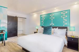 Postel nebo postele na pokoji v ubytování Hotel ZAZZ