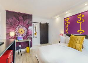 Postel nebo postele na pokoji v ubytování Hotel ZAZZ