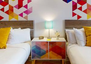 Postel nebo postele na pokoji v ubytování Hotel ZAZZ