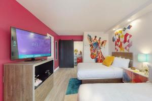 TV a/nebo společenská místnost v ubytování Hotel ZAZZ