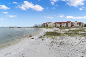 a view of the beach at the resort at Sunset Harbor Palms 1-311 in Navarre