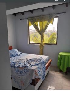 Postel nebo postele na pokoji v ubytování Hotel cambulos