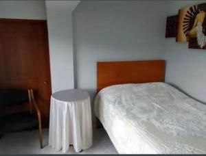 Postel nebo postele na pokoji v ubytování Hotel cambulos