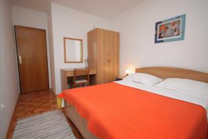 Postel nebo postele na pokoji v ubytování Apartment Krk 3231e