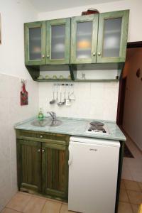 Kuchyň nebo kuchyňský kout v ubytování Apartment Krk 3231e
