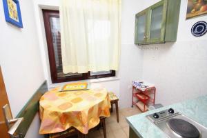 TV a/nebo společenská místnost v ubytování Apartment Krk 3231e