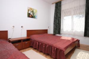 Postel nebo postele na pokoji v ubytování Family friendly seaside apartments Sukosan, Zadar - 3273