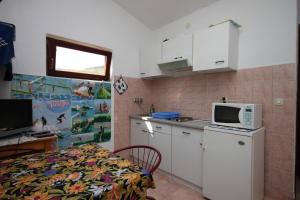 Fotografia z galérie ubytovania Apartments by the sea Metajna, Pag - 3304 v destinácii Zubovići