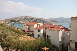 Fotografia z galérie ubytovania Apartments by the sea Metajna, Pag - 3304 v destinácii Zubovići
