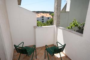 Balkón nebo terasa v ubytování Apartments and rooms with parking space Palit, Rab - 3195