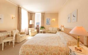 Ліжко або ліжка в номері Hotel Tamaro