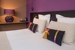 Postel nebo postele na pokoji v ubytování Hotel Restaurant Spa Ivan Vautier + 33 fotografií
