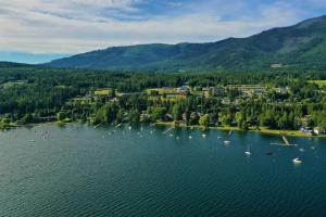 an aerial view of a lake with boats and a town at Sorrento Inn Motel in Sorrento