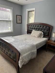 a bedroom with a large bed in a room at Beautiful Private West Knoxville Home 2700sf, 4 Beds, 2 & half Baths in Knoxville