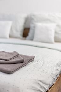 Postel nebo postele na pokoji v ubytování Jeseníky Apartmán číslo 5