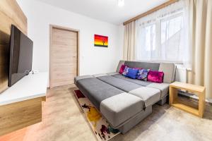 Postel nebo postele na pokoji v ubytování Jeseníky Apartmán číslo 5
