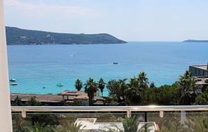 a view of the ocean from a balcony at Swiss Residence Montenegro in Herceg-Novi