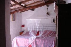 Un pat sau paturi într-o cameră la Villa Binami