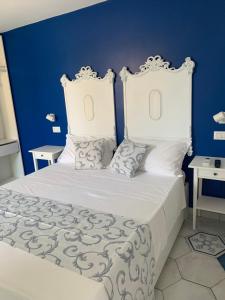 Letto o letti in una camera di Le Case di Don Andrea