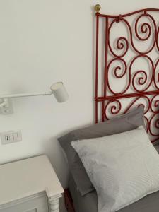 Letto o letti in una camera di Le Case di Don Andrea