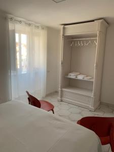 Letto o letti in una camera di Le Case di Don Andrea