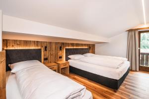 Posteľ alebo postele v izbe v ubytovaní Chalet Scherlin