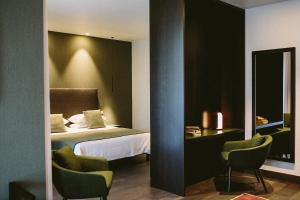 Postel nebo postele na pokoji v ubytování Hotel Piccola Vela