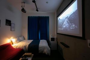 Postel nebo postele na pokoji v ubytování Theatel Haneda Ⅱ
