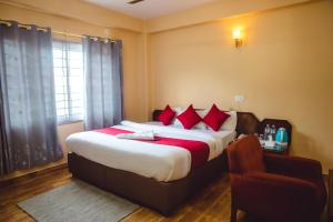 Postelja oz. postelje v sobi nastanitve Hotel Yatri