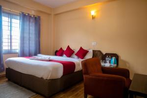 Postelja oz. postelje v sobi nastanitve Hotel Yatri