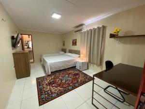 Postel nebo postele na pokoji v ubytování Bertolini Hotel