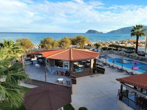 an aerial view of a resort with a swimming pool at Jannos Beach hotel in Laganas