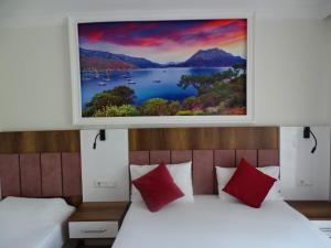 Cama ou camas em um quarto em Arikanda River Garden Hotel