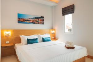 Postel nebo postele na pokoji v ubytování Grand Gala Villa