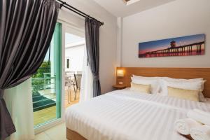 Postel nebo postele na pokoji v ubytování Grand Gala Villa