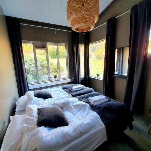 Postelja oz. postelje v sobi nastanitve The Bank Sleeping Guesthouse