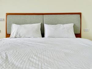 Krevet ili kreveti u jedinici u objektu 浯島文旅WD Hotel