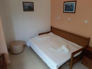 Ένα ή περισσότερα κρεβάτια σε δωμάτιο στο Apartment in Mpenitses near Beaches & Pool