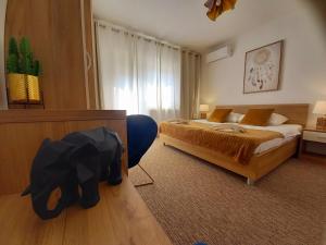 Postel nebo postele na pokoji v ubytování Studio Apartmani “Jarnečić”