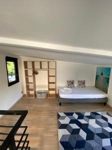 Postel nebo postele na pokoji v ubytování BUNGALOW LE COROSSOL