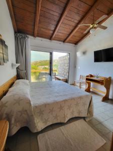 Postel nebo postele na pokoji v ubytování Hotel Olimpia