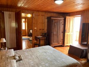Postel nebo postele na pokoji v ubytování B&B Maison Vallomy