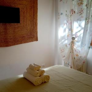 A bed or beds in a room at La casetta di Mizar