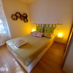 A bed or beds in a room at La casetta di Mizar
