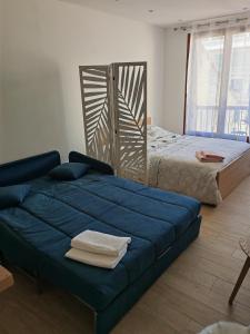 Posteľ alebo postele v izbe v ubytovaní Marseille : Studio cosy bien situé