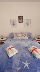 Postel nebo postele na pokoji v ubytování Casa Rosa