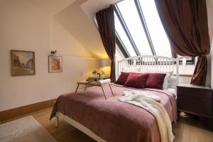 Posteľ alebo postele v izbe v ubytovaní Billionaires Club LOFT Sauna City Center