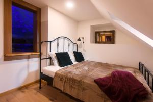 Posteľ alebo postele v izbe v ubytovaní Billionaires Club LOFT Sauna City Center